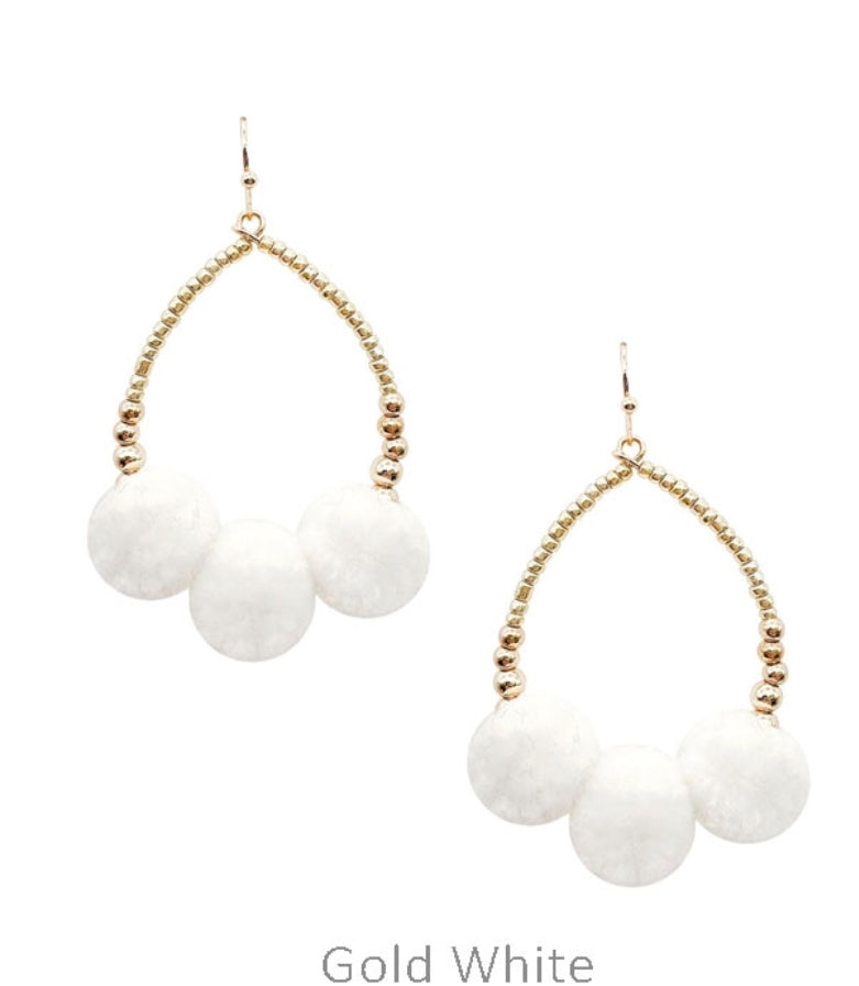 Pompom on teardrop earrings