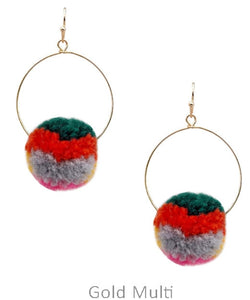 Pompom on hoop earrings