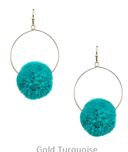 Pompom on hoop earrings