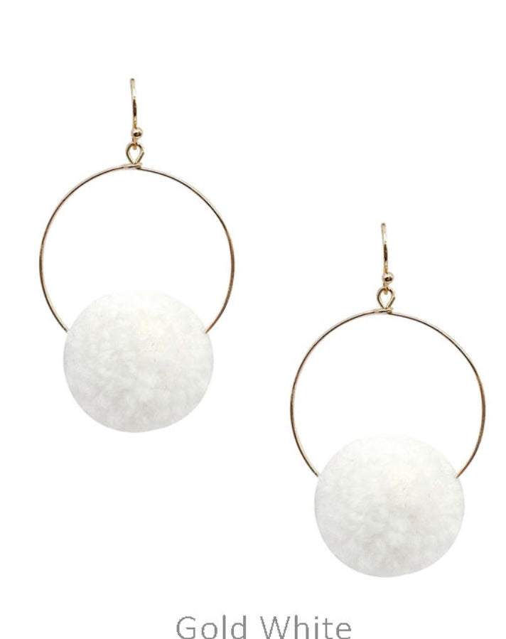 Pompom on hoop earrings