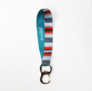 Bottle opener wristlet